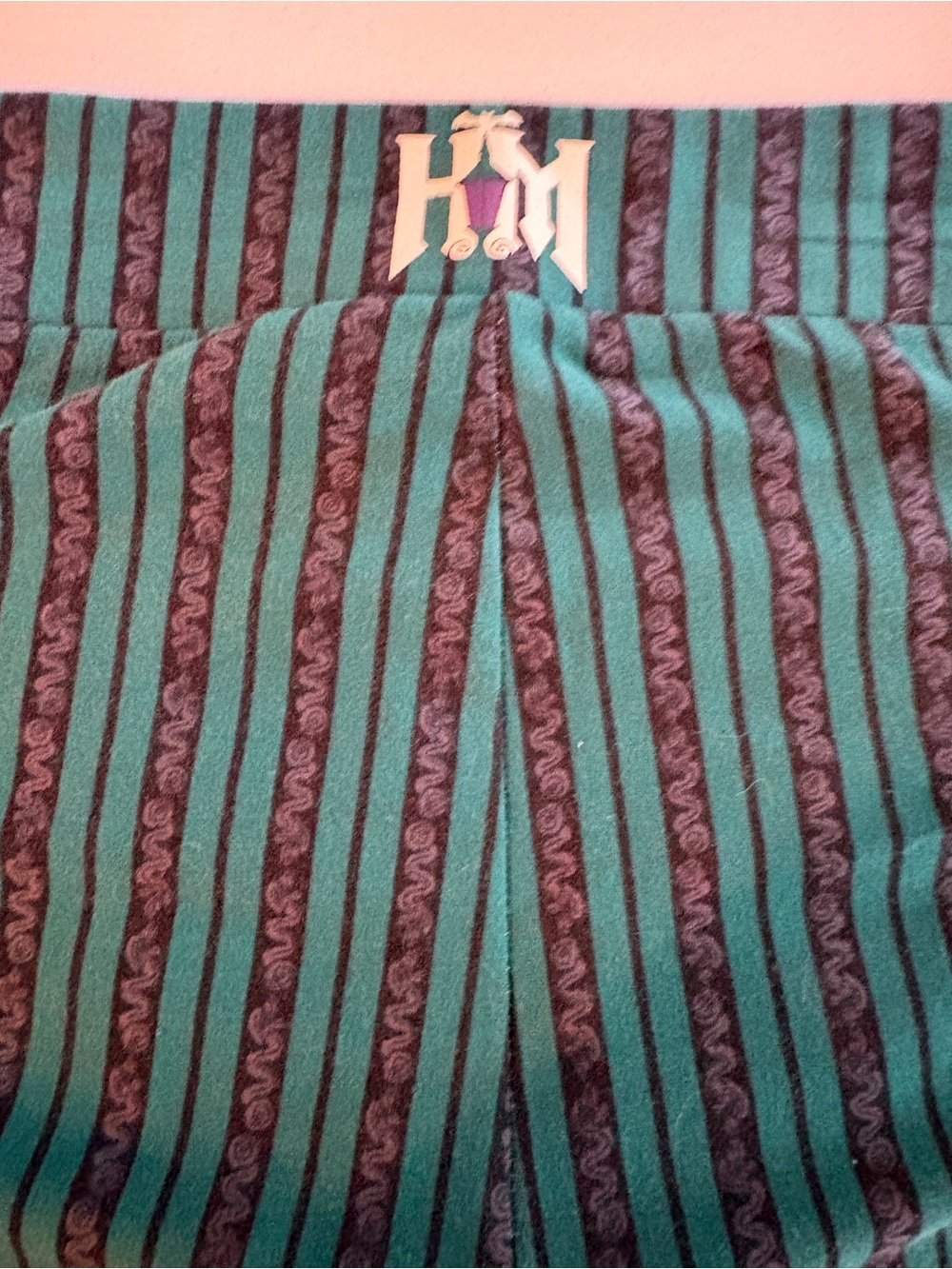 Torrid Haunted Mansion Uniform Teal and Black Striped Capris